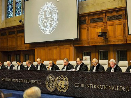 Российский националист просит Международный трибунал в Гааге расследовать преступления Путина