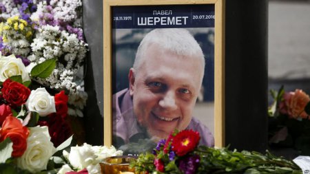 Тело Павла Шеремета упокоили в Минске рядом с могилой его отца. ФОТО