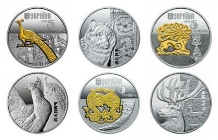 Нацбанк ввел в обращение монеты с изображениями оленя, волка и павлина